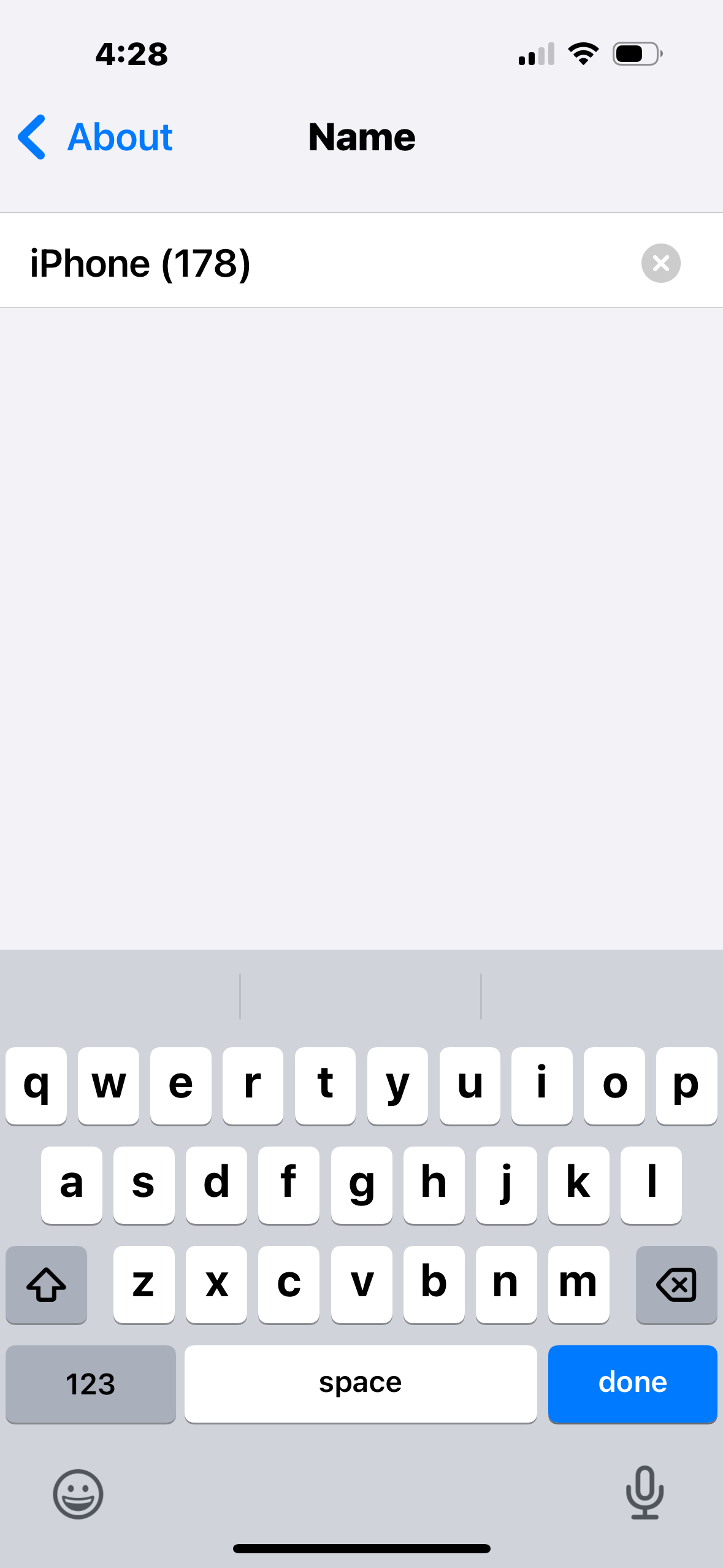 iPhone showing the field for editing the device name.