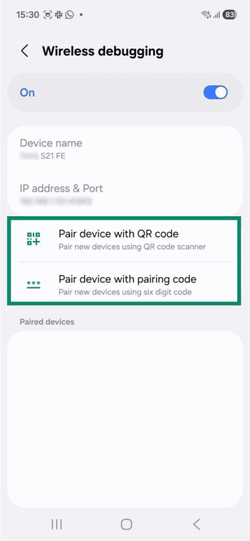 The "Wireless debugging" settings on an Android phone. The "Pair device with QR code" and "Pair device with pairing code" options are highlighted.